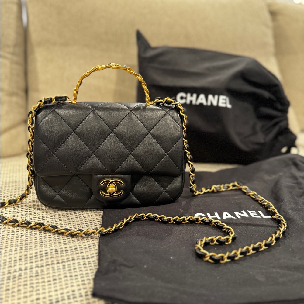 Chanel 24-25 Top Handle Quilted Mini Flap Bag in Black Lambskin